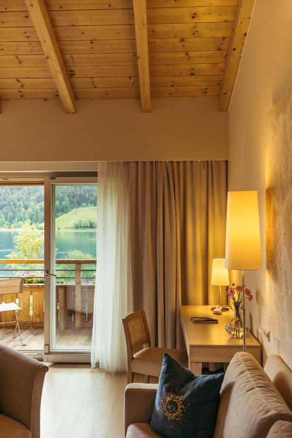 Strandhotel Am Weissensee Exteriör bild